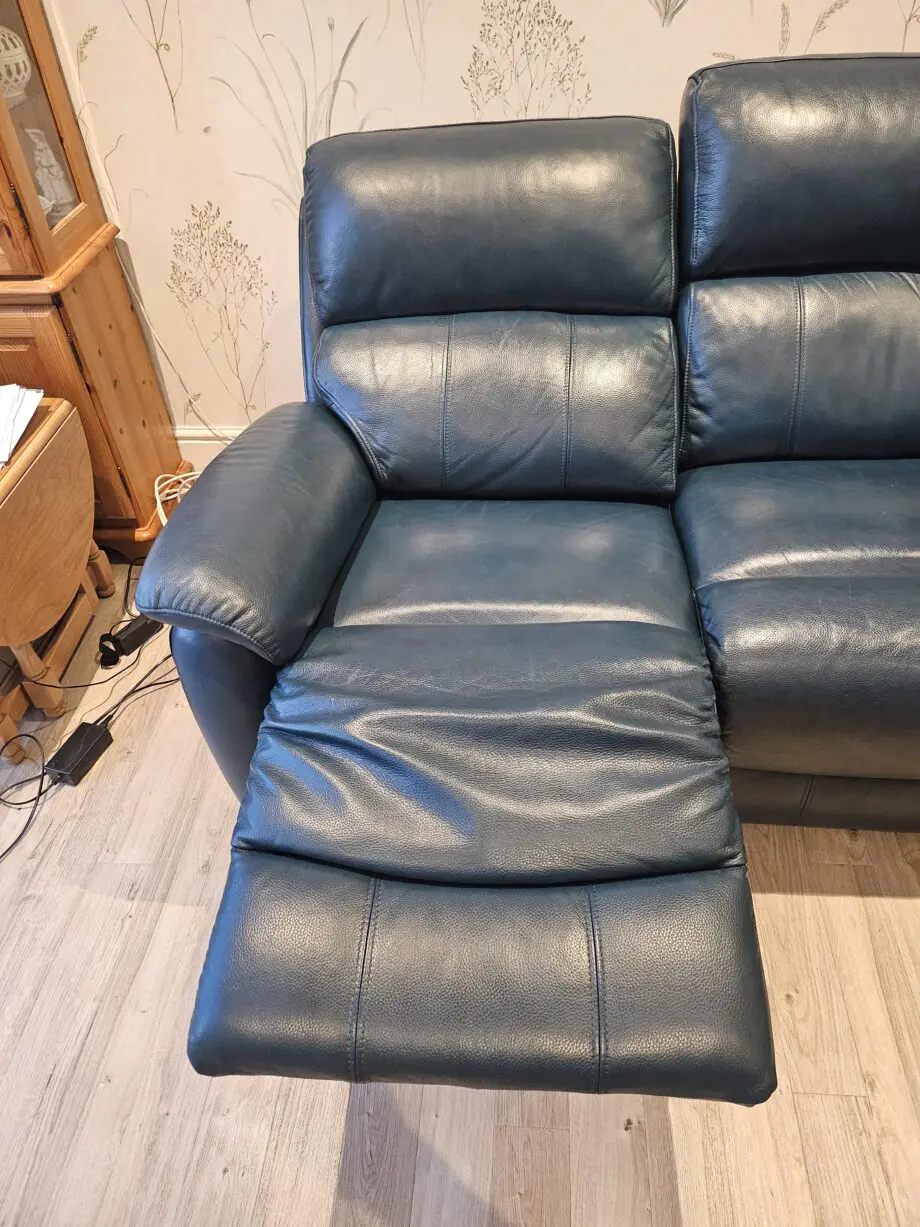 Teal leather 2 seater recliner sofa by DFS