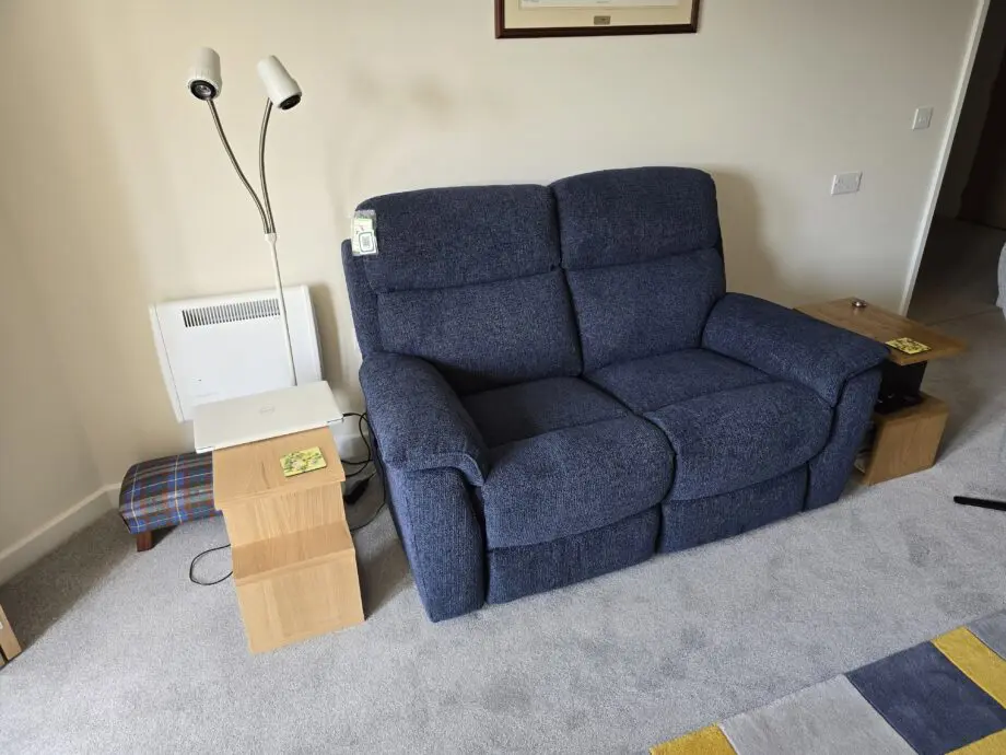 DFS Royal blue 2 seater recliner sofa