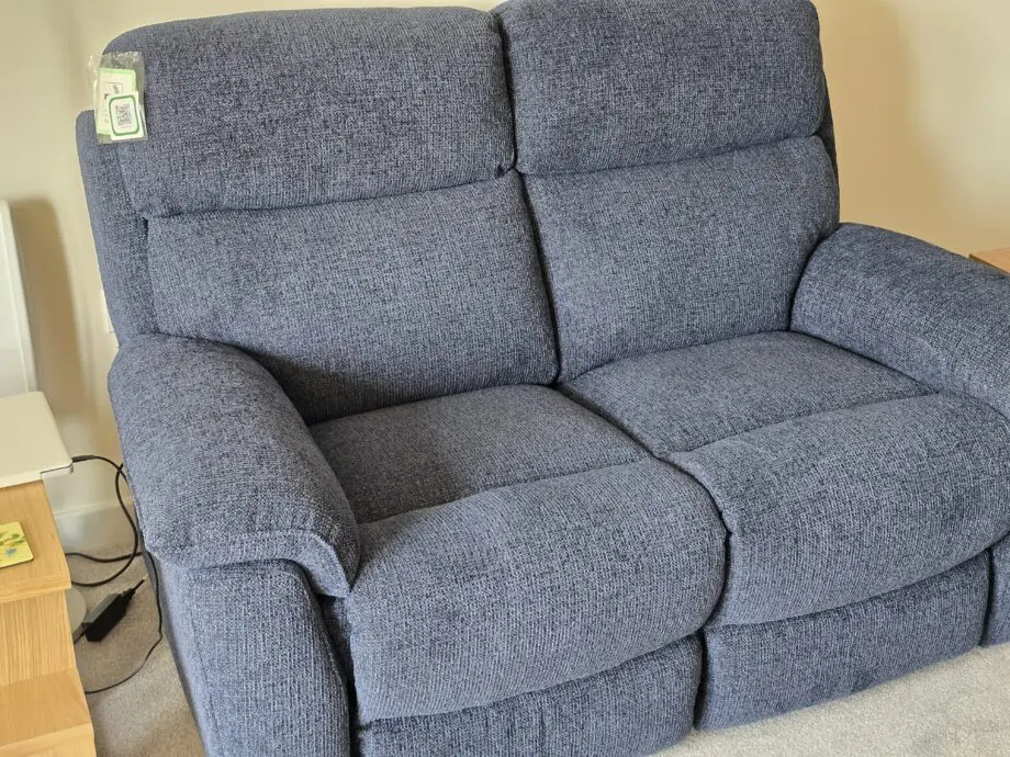DFS Royal blue 2 seater recliner sofa