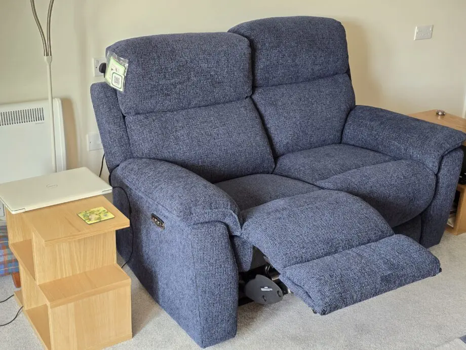 DFS Royal blue 2 seater recliner sofa