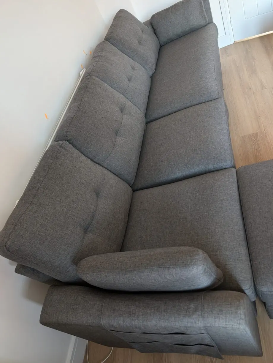 Grey 4 seater sofa with a chaise