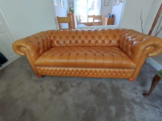 Pair of genuine leather SAXON chesterfield sofas