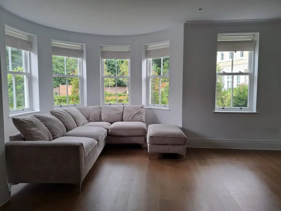 Grey and silver corner sofa