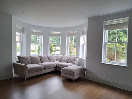 Grey and silver corner sofa