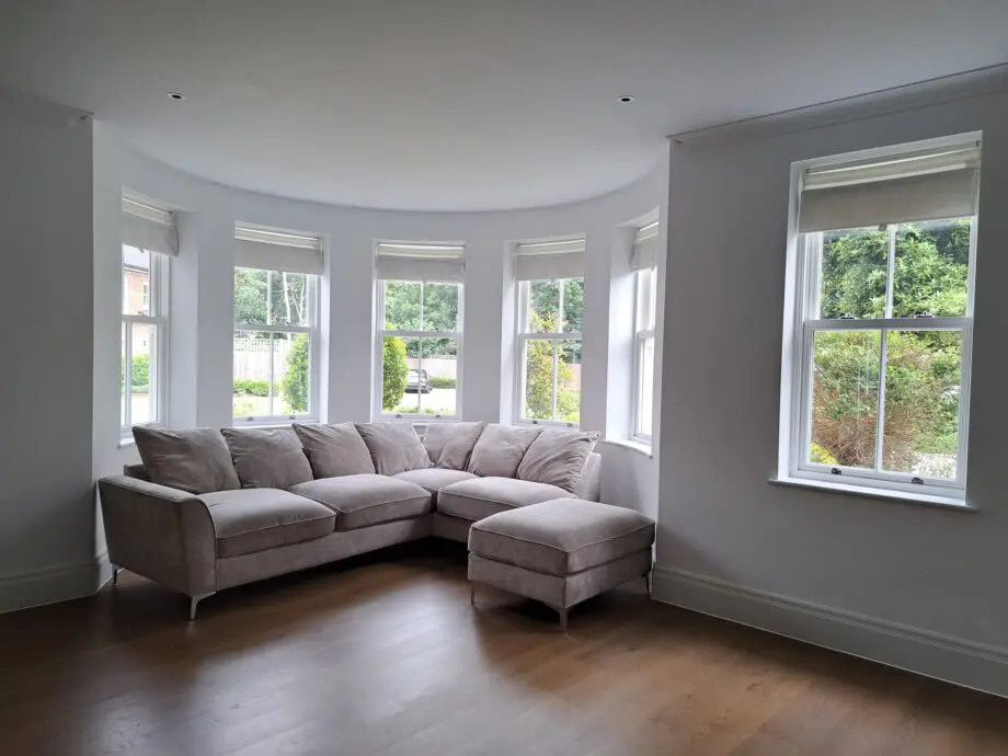 Grey and silver corner sofa