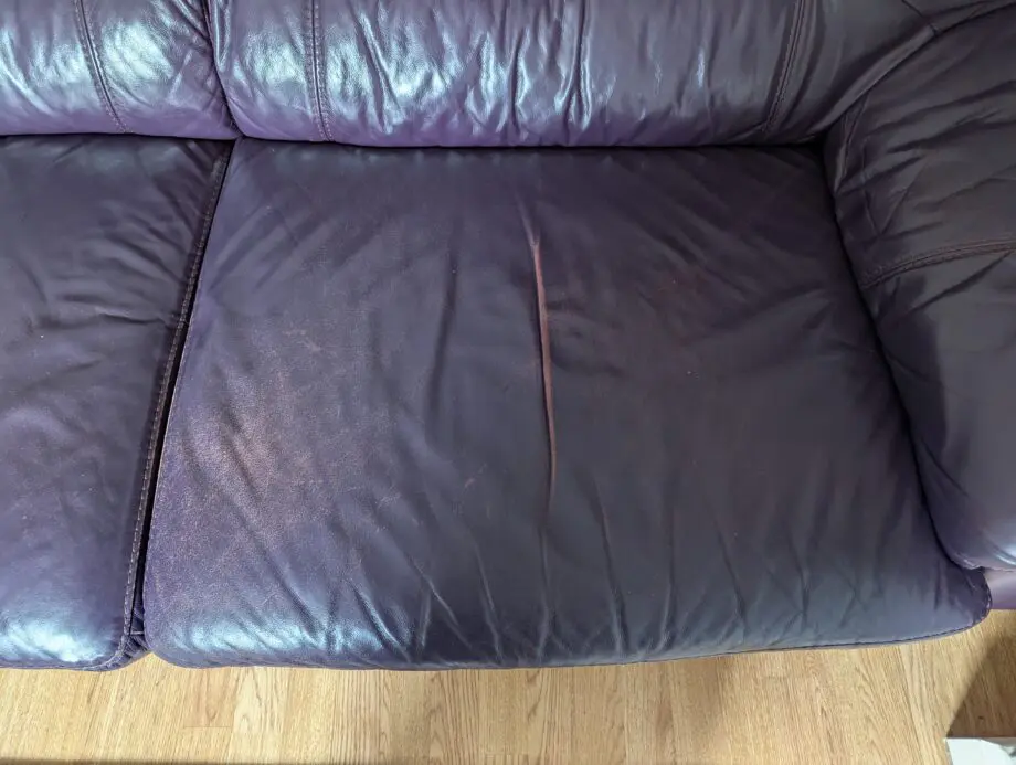 DFS Aubergine leather sofa 3 pieces