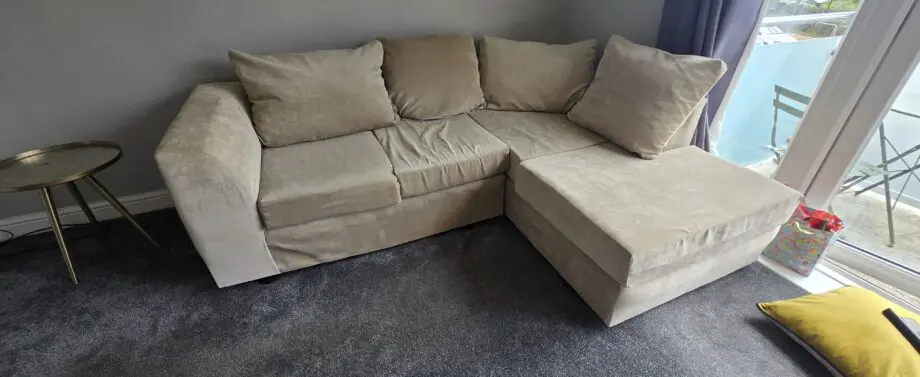 Barely used 3 seater L shape sofa in beige