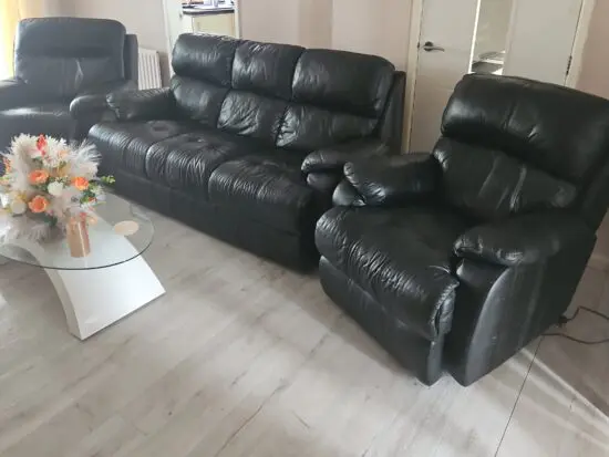 Black real leather SCS 3 piece suite, static sofa and 2 electric recliner armchairs