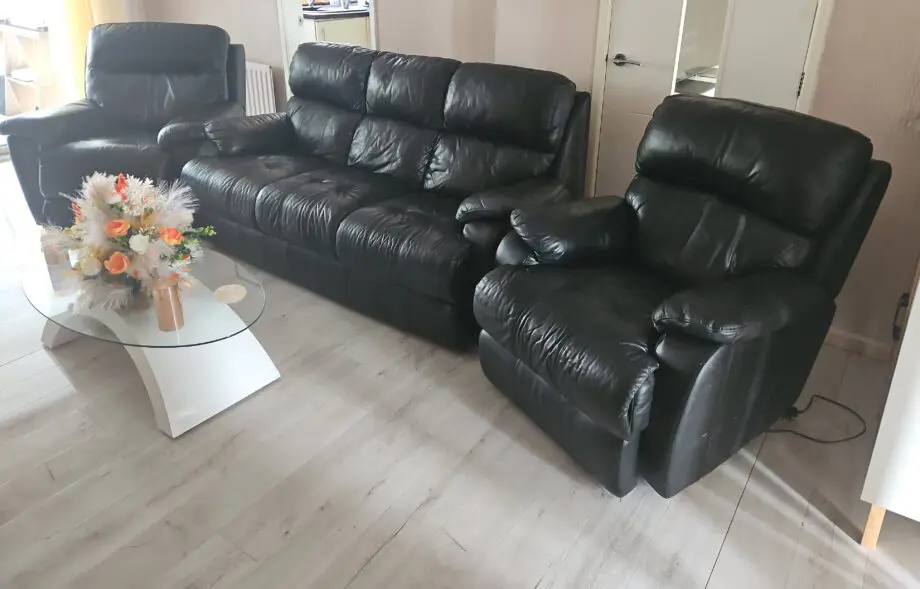 Black real leather SCS 3 piece suite, static sofa and 2 electric recliner armchairs