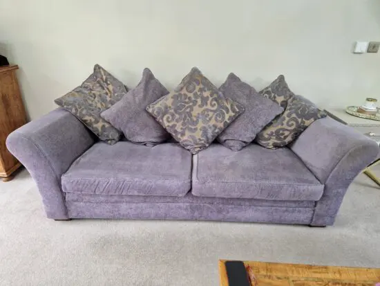 DFS Grey with Gold patterned sofa.