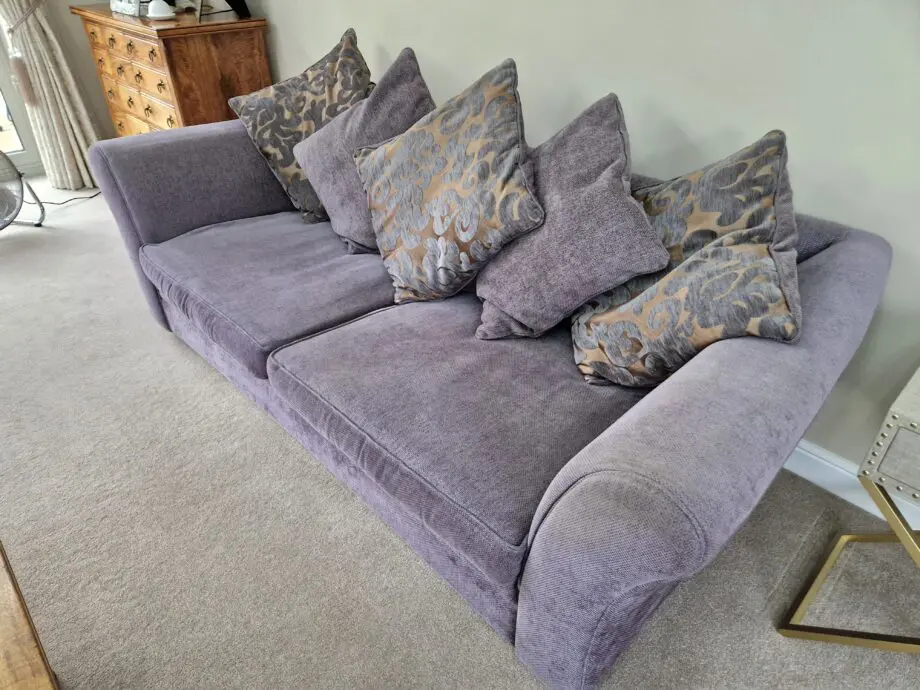 DFS Grey with Gold patterned sofa.