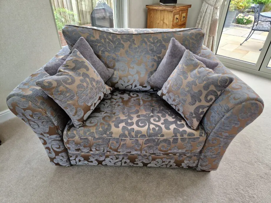 DFS Grey and Gold patterned sofa
