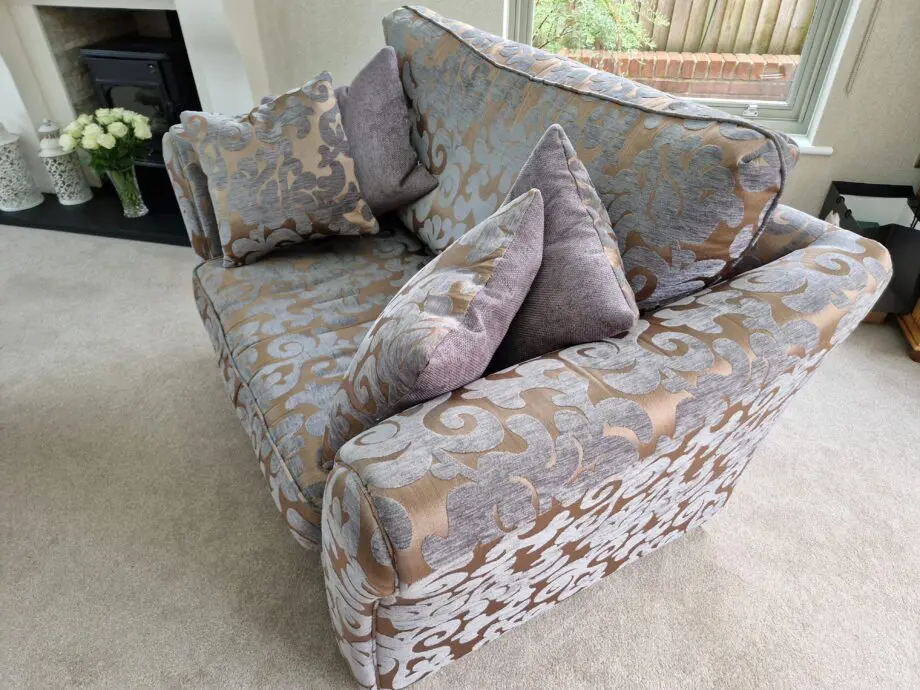 DFS Grey and Gold patterned sofa