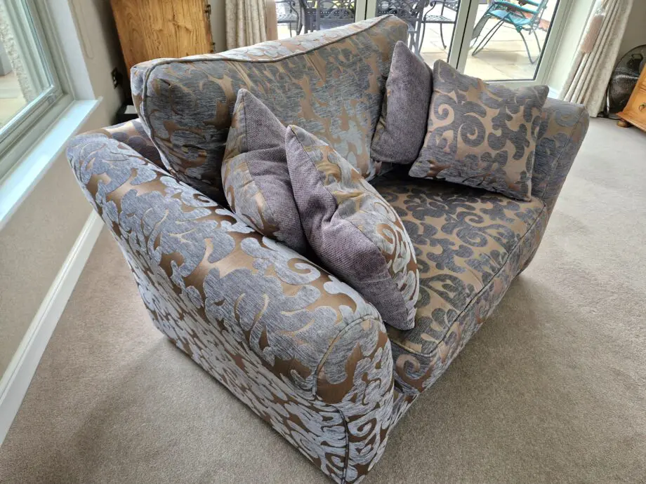 DFS Grey and Gold patterned sofa