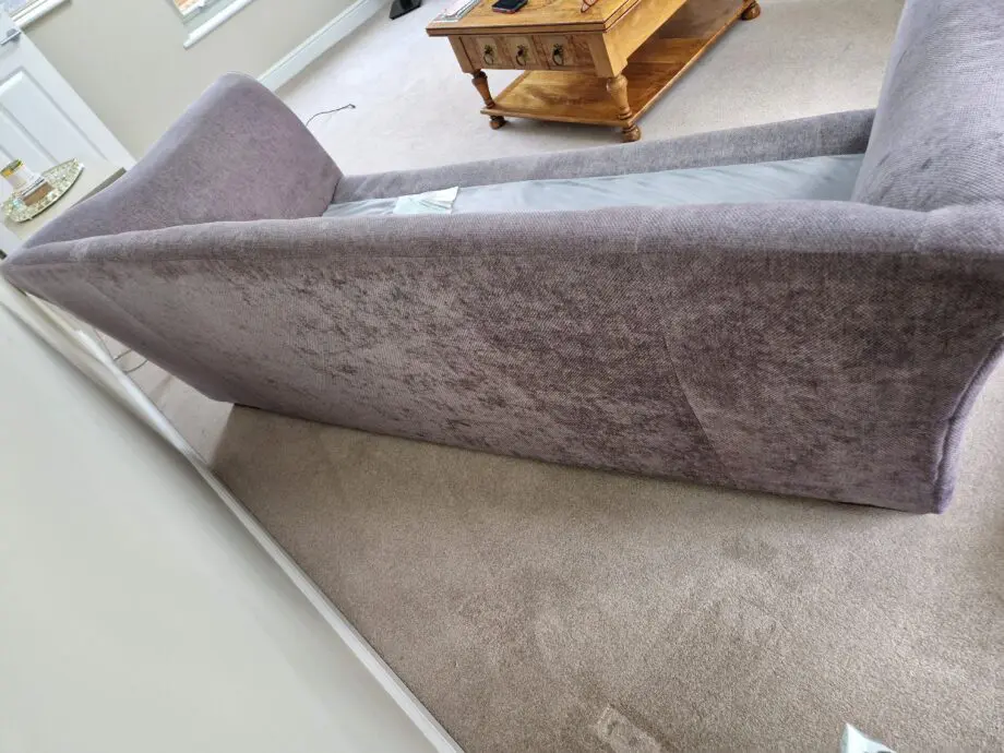 DFS Grey with Gold patterned sofa.