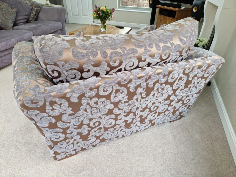 DFS Grey and Gold patterned sofa