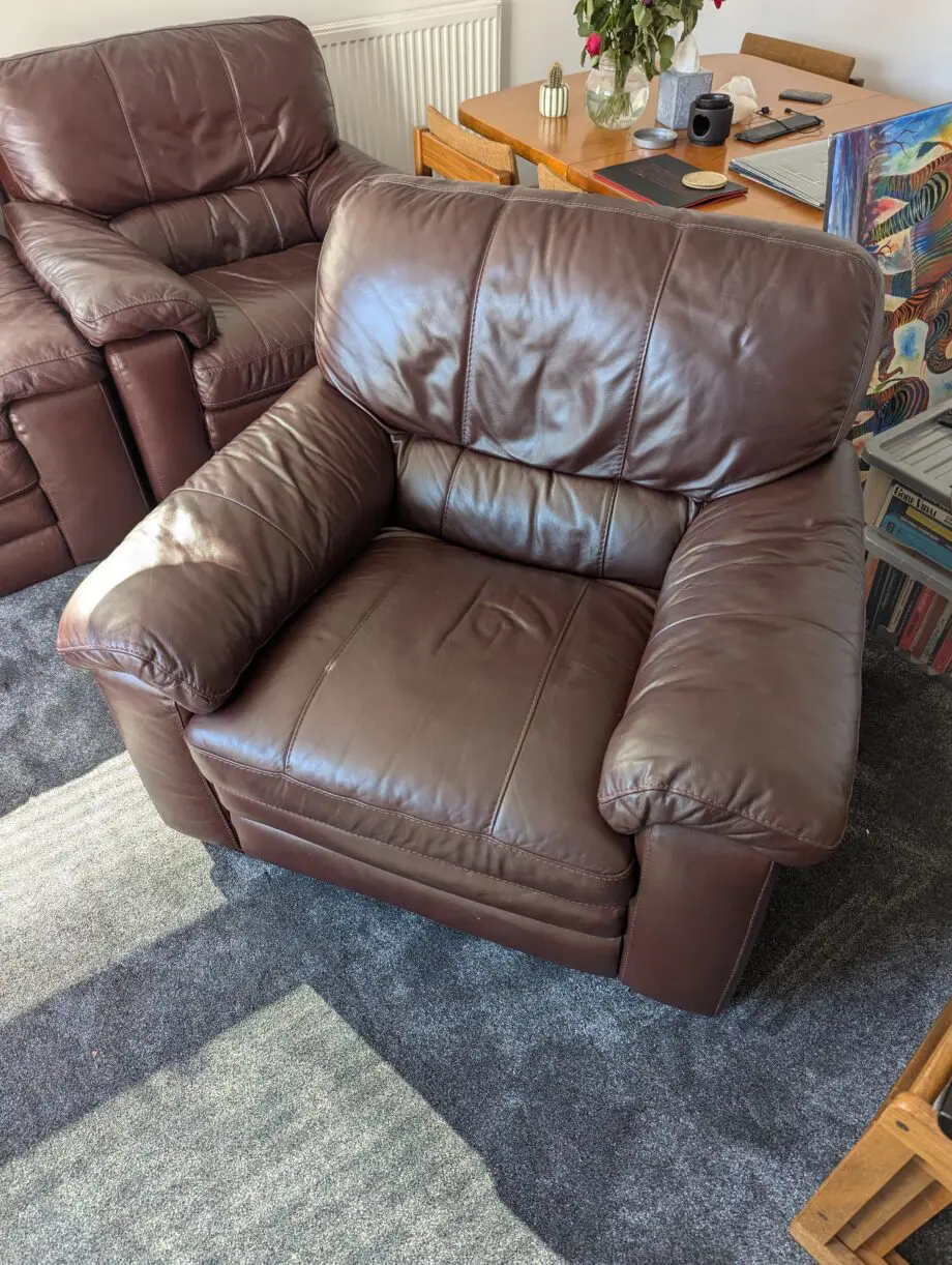 Brown leather three-piece sofa set
