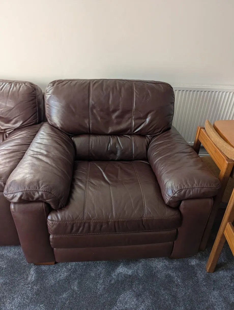 Brown leather three-piece sofa set