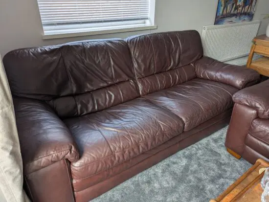 Brown leather three-piece sofa set