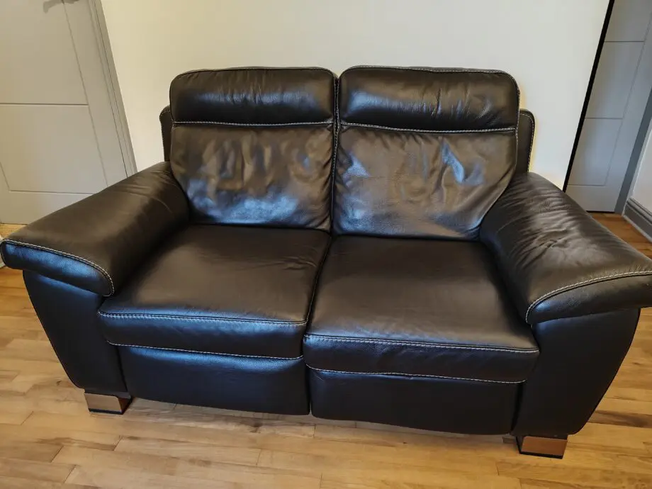 Black leather power reclining Arcadia sofa