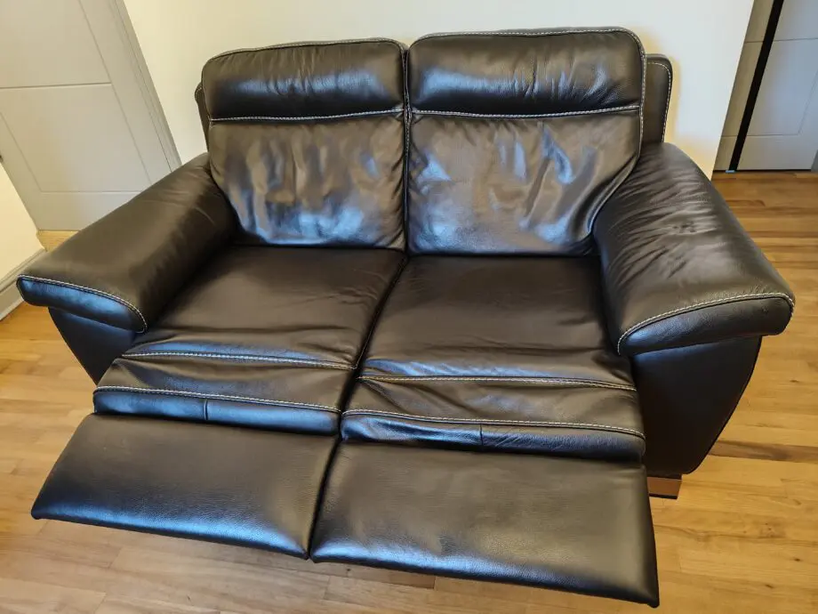 Black leather power reclining Arcadia sofa