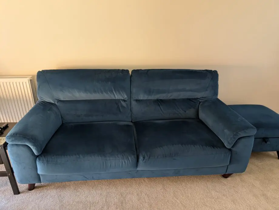 Blue velvet sofa