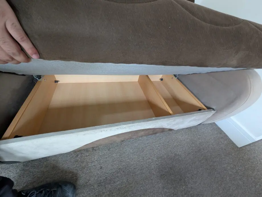 Brown 2 seater sofa with storage