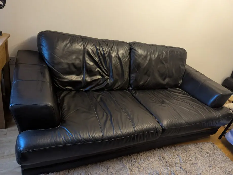 3 & 2 Black Leather Sofa Set with Ottoman