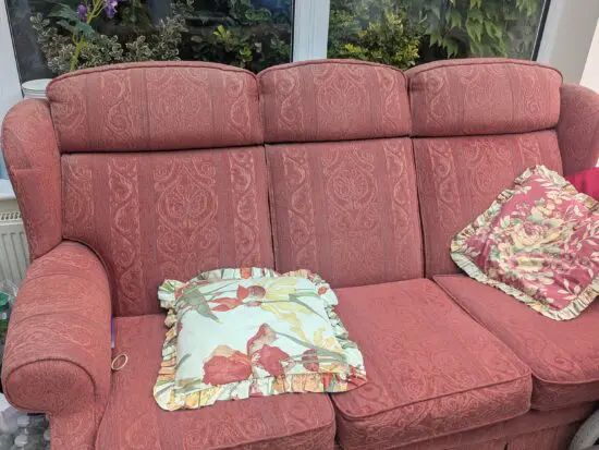 Old Parker Knoll three seater , doesn't met fire regs so would need to be reupholstered .