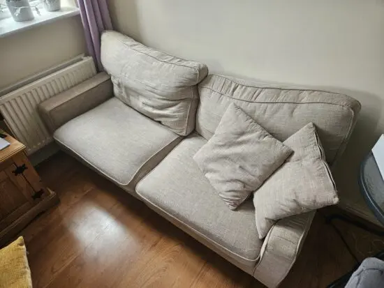 Beige 2 seater sofa
