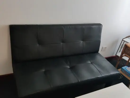 Black two seater sofa