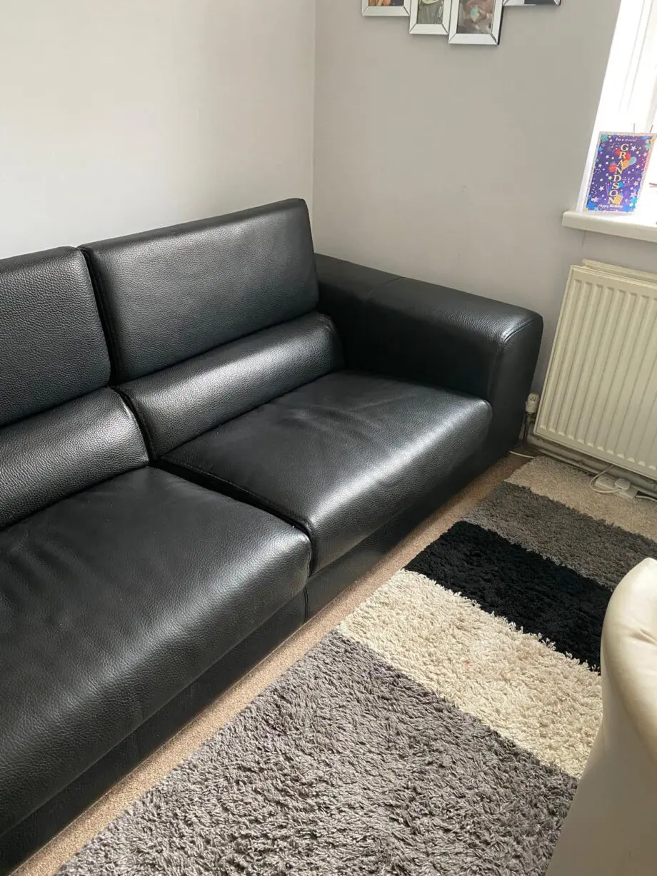 Roche Bobois black sofa