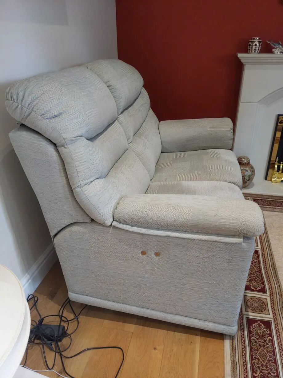 Furniture Village G Plan, high-backed 2 seater recliner sofa in grey with matching footstool