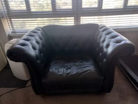 Black leather love Seat