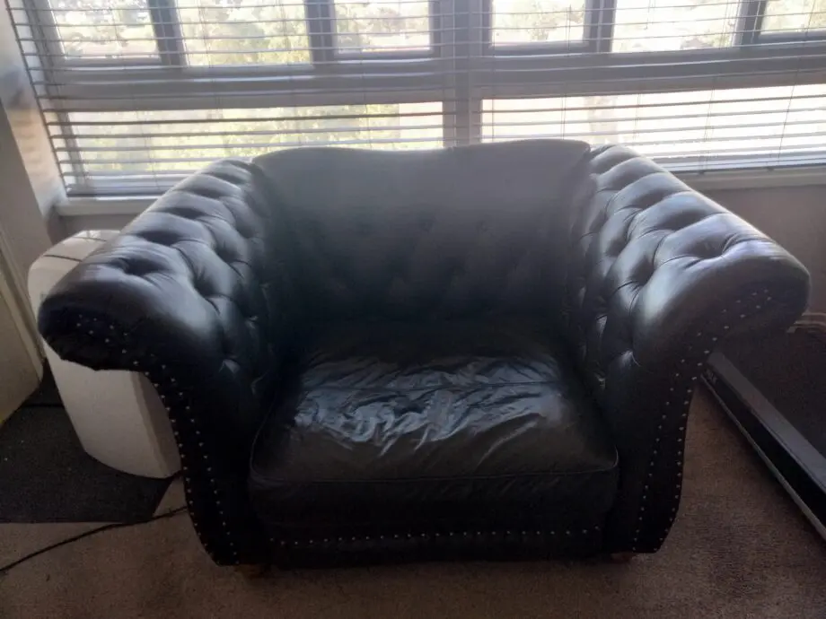 Black leather love Seat