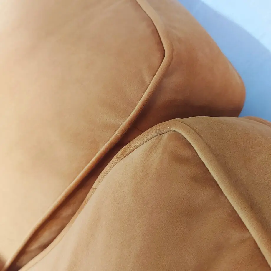 DFS Corner Sofa in velvet cinnamon & storage footstool