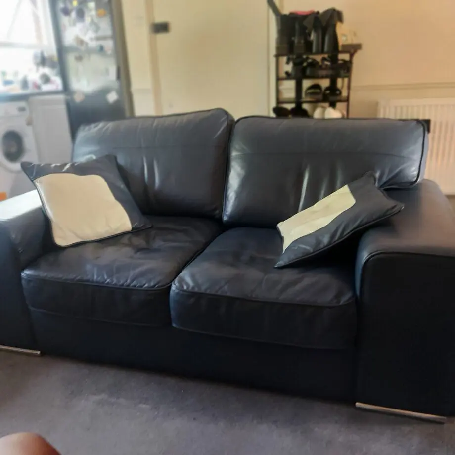 DFS Navy Blue 2 Seater Leather Sofa