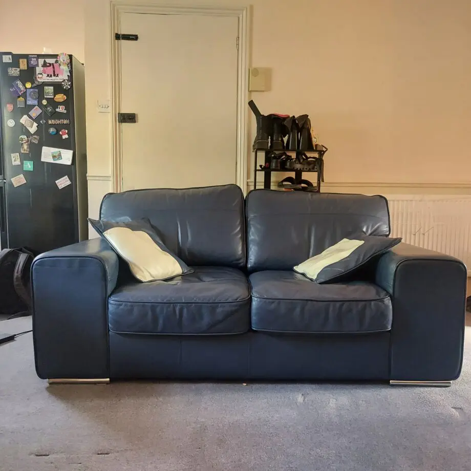 DFS Navy Blue 2 Seater Leather Sofa