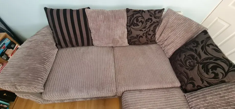 DFS grey corner sofa with scatter cushions