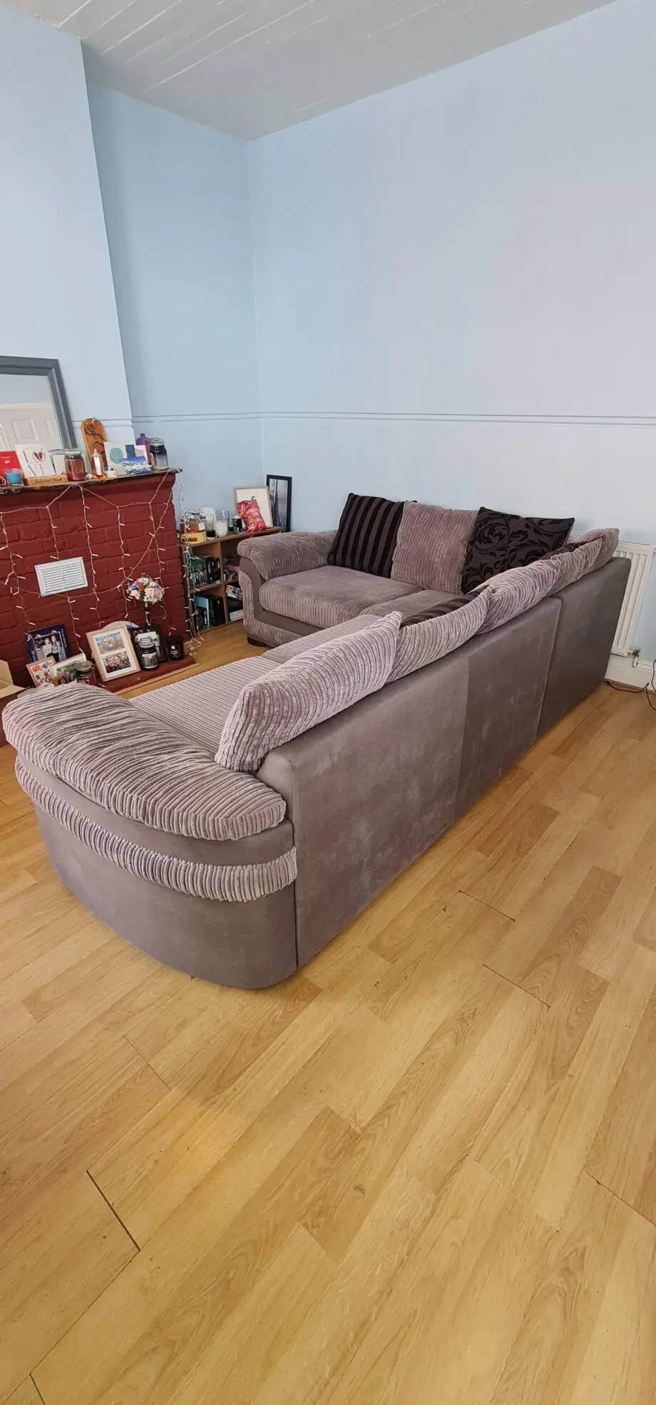 DFS grey corner sofa with scatter cushions