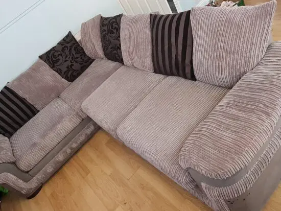 DFS grey corner sofa with scatter cushions