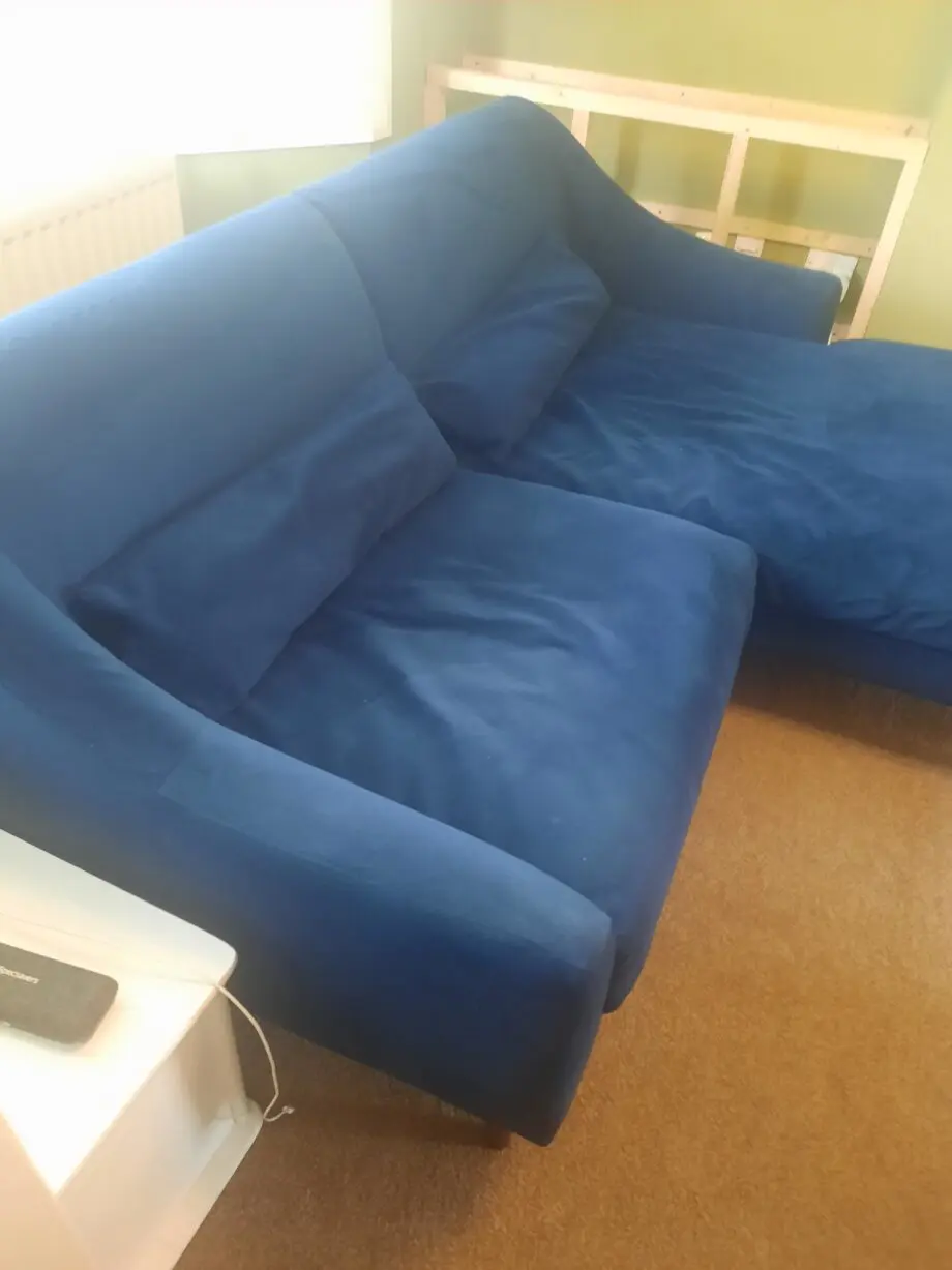 Blue chaise lounge from Made.com in navy blur