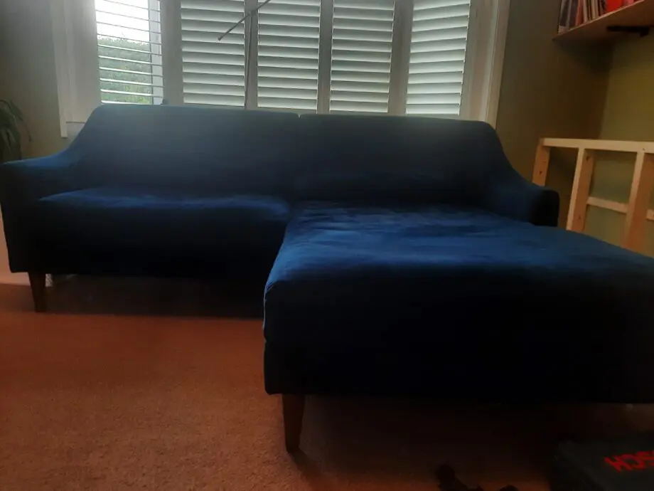 Blue chaise lounge from Made.com in navy blur