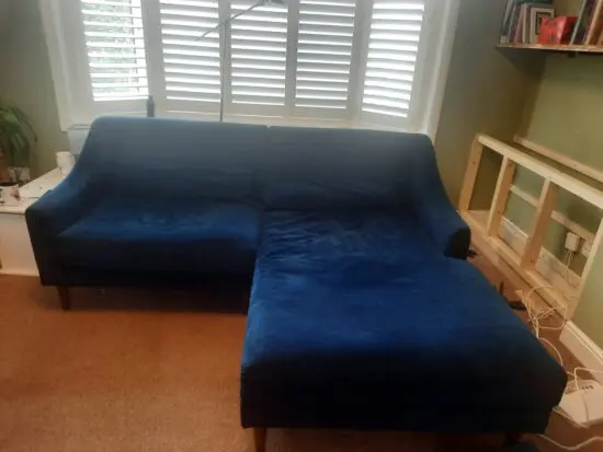 Blue chaise lounge from Made.com in navy blur