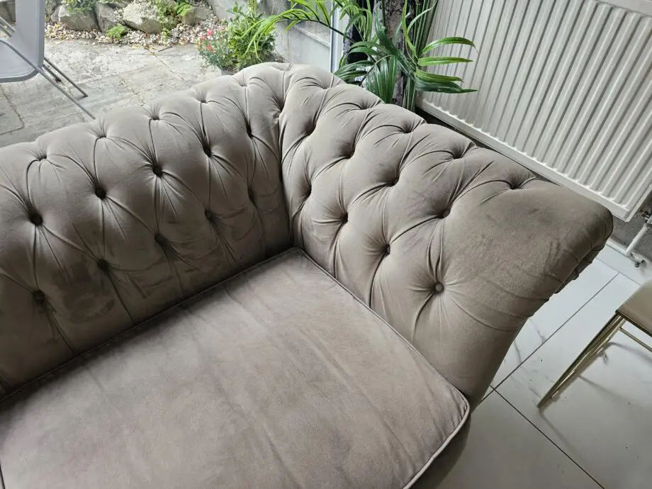 Two grey velvet sofas