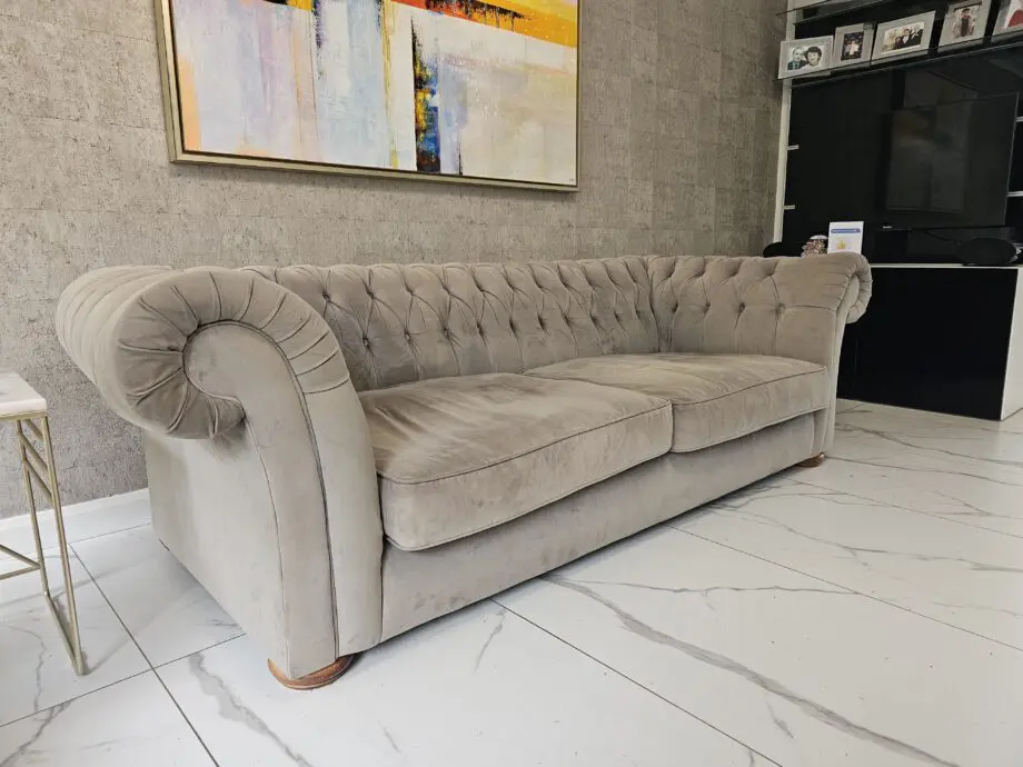 Two grey velvet sofas