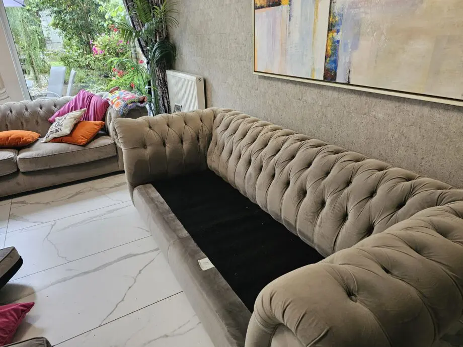 Two grey velvet sofas