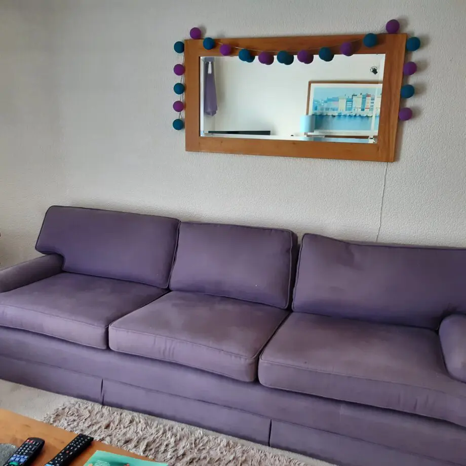 very elegant four seater sofa soft Damson colour