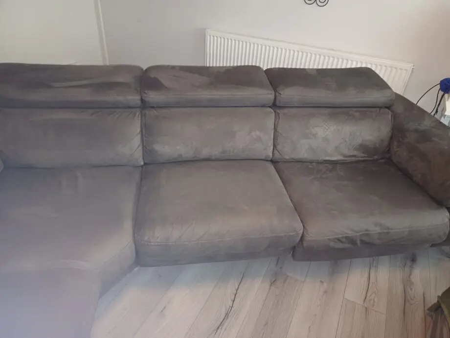 DFS brown suede corner sofa.