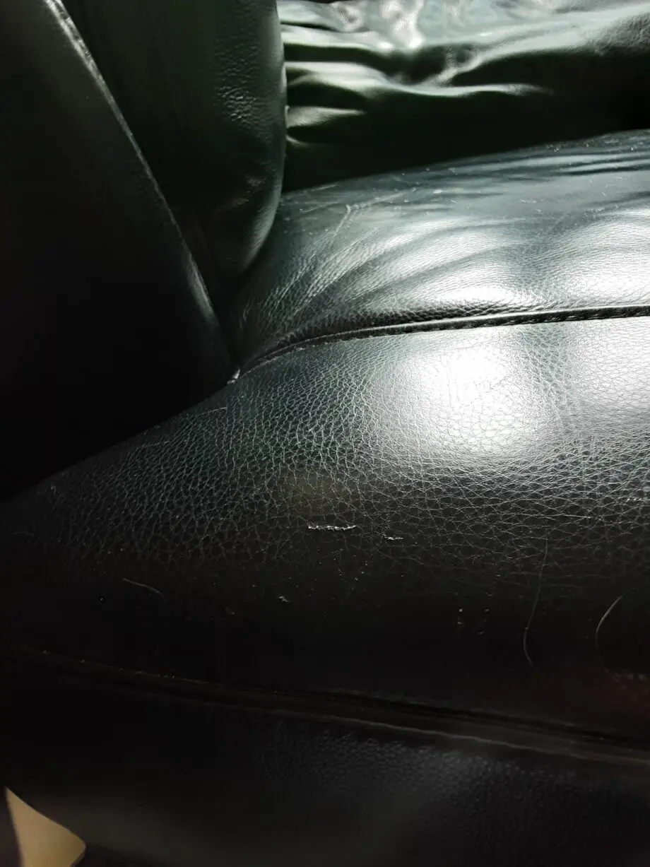 Black Leather swivel cuddle chair